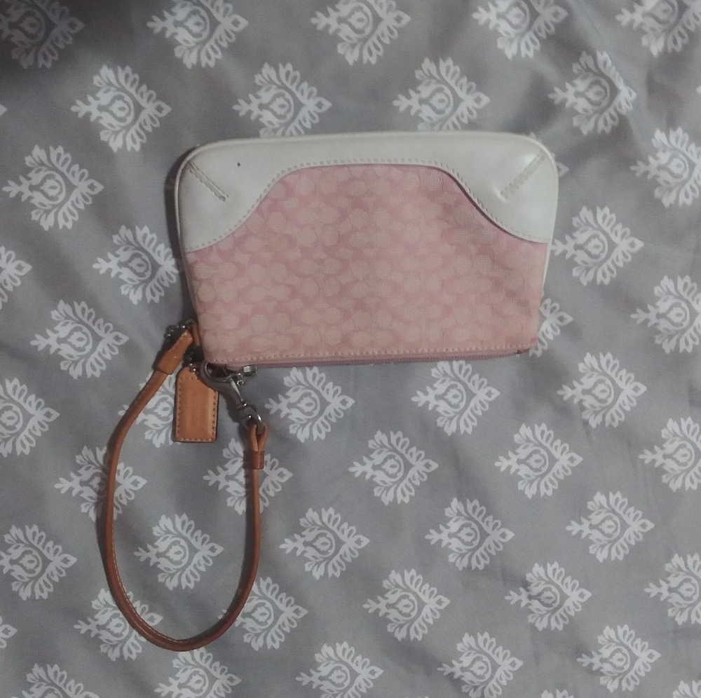 Peach and white coach wristlet